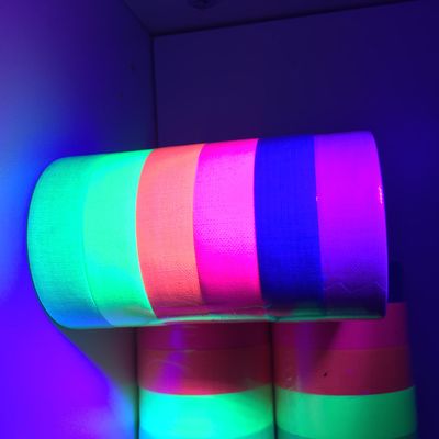 Nastro d'avvertimento della luce ultravioletta di nastro adesivo di cotone del nastro fluorescente al neon luminoso UV del panno per il partito fornitore